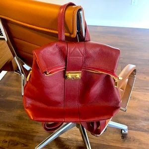 Red leather back pack